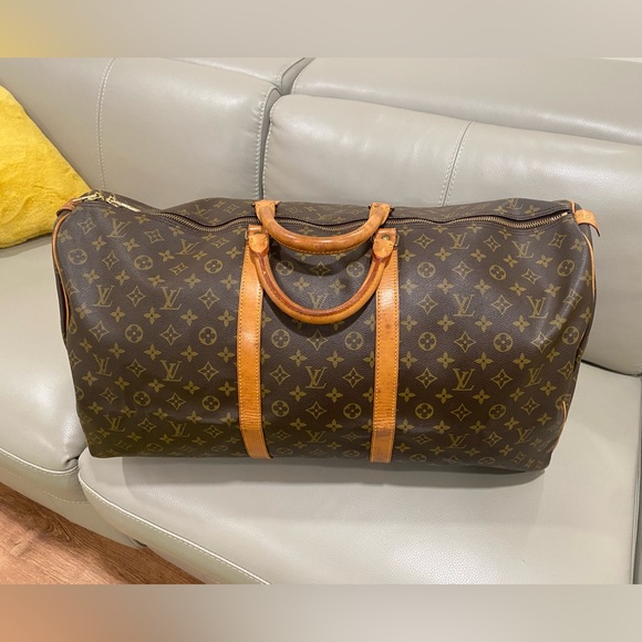 Louis Vuitton Handbags - Louis Vuitton Brown Monogram Travel Duffel with Tan Leather Trim